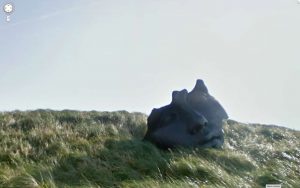 Google Street View photograph of broken head statue